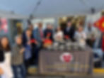 Quality Cultural Service Center distributing food and red envelopes