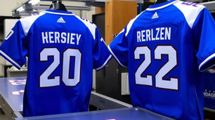 Custom team jerseys being screen printed by a local production team in Tracy, California
