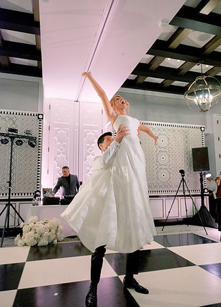 Wedding couple learning ballroom dance in Encinitas studio