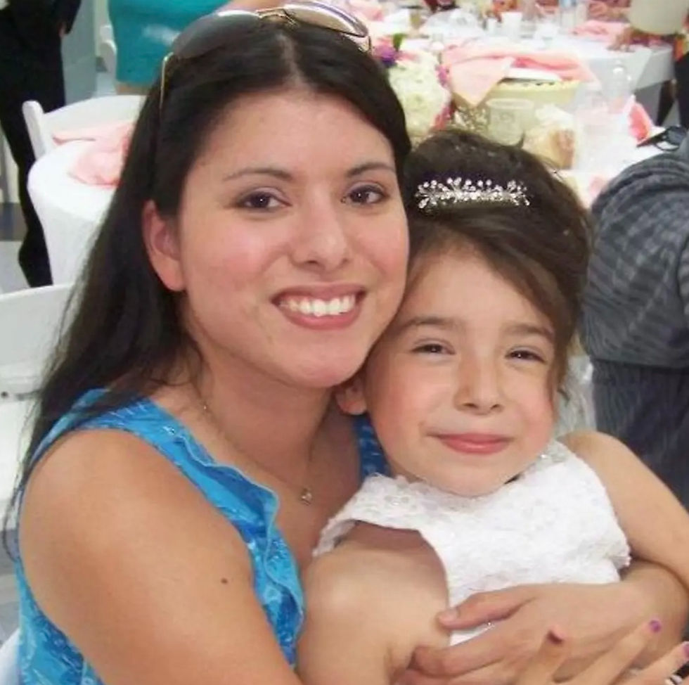 My mom and I, at my uncle's wedding when I was six.