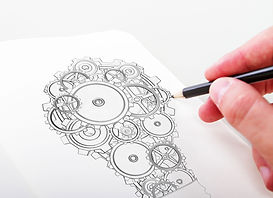 roues dentées et un crayon