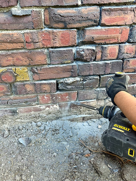 A heritage brick wall that is being repointed by Lennox Masonry in the Cowichan Valley