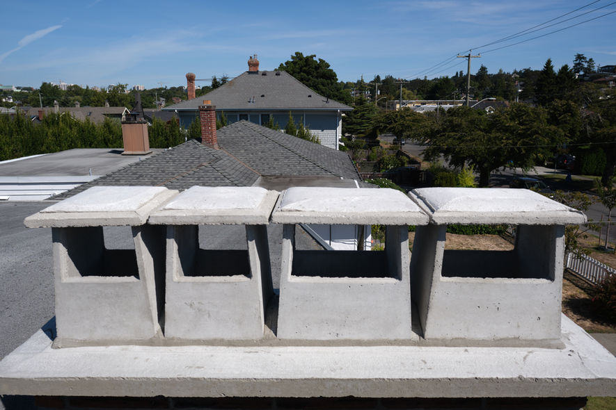 A brick chimney repaired and rebuilt by Lennox Masonry in Victoria BC