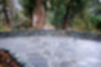 Flagstone patio and retaining wall in Sidney BC built by Lennox Masonry
