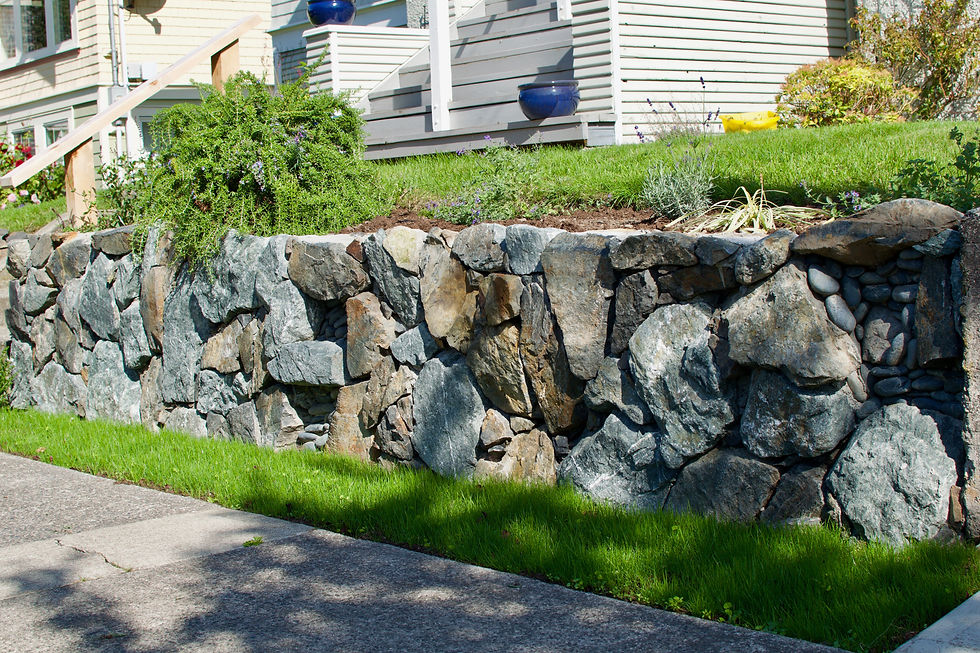 A stone retaining wall built by Lennox Masonry in the Fairfield area of Victoria BC