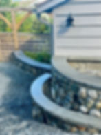 Stone walls and stone pillars being built by Lennox Masonry in Mill Bay, BC