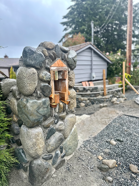 Stone and river rock retaining walls being built by Lennox Masonry in Mill Bay, BC