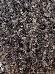 close up picture of black curly hair