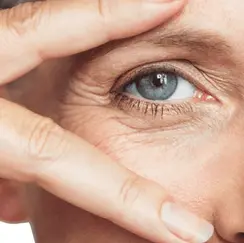 Close-up of a woman's eye with wrinkles