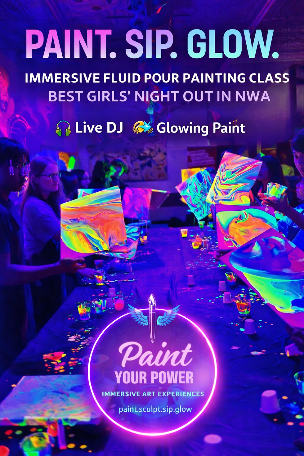 Eye-level view of a colorful paint palette and wine glass on a wooden table