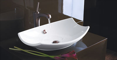 chrome faucet and white bathroom sink