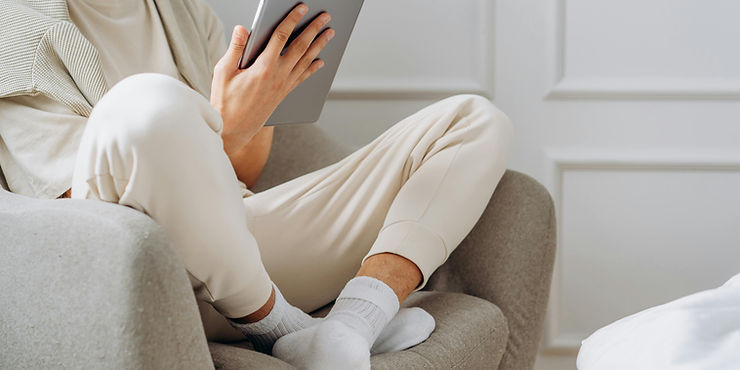 Man looking for a new job reading a misleading job ad posted by a recruiter