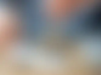 A person is stamping a passport during entry/exit