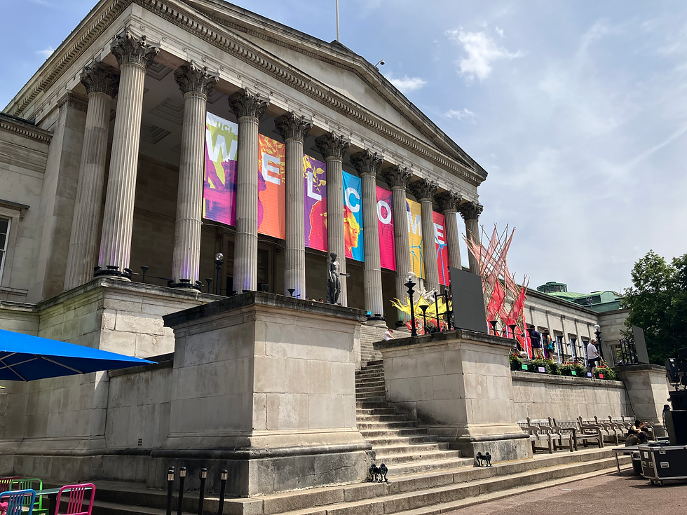 Front entrance to the University College of London with brightly colored welcome banners