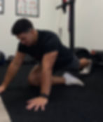 Male Chiropractor Demonstrating Exercise