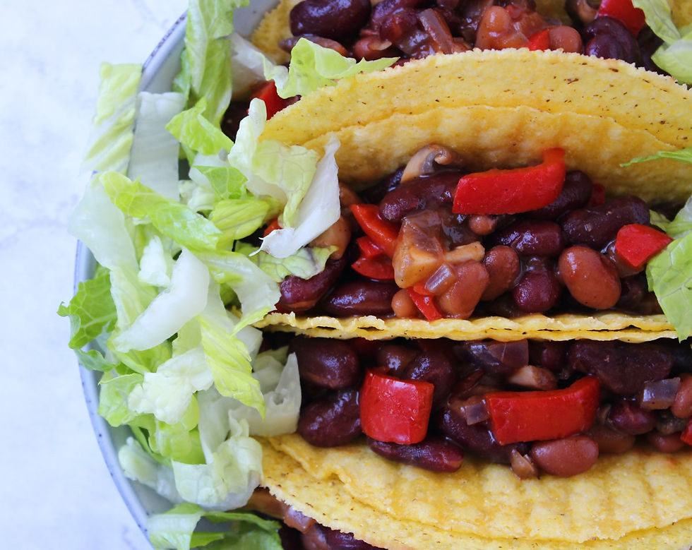 Healthy dinner containing bean and veggie tacos