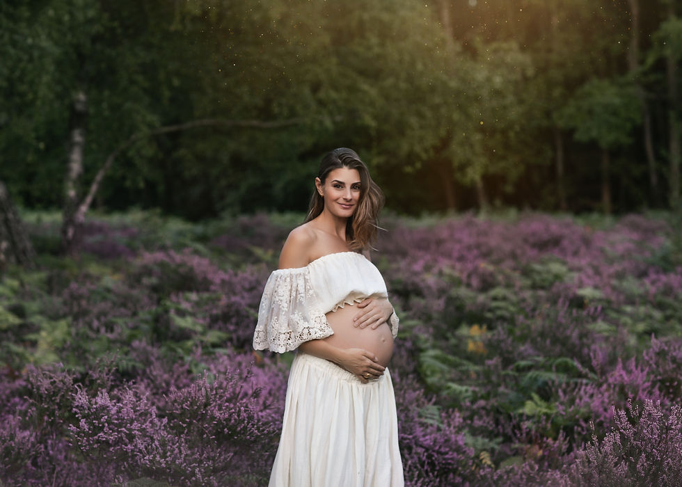 Expectant mother during an outdoor maternity session in Bromley, Kent at sunset