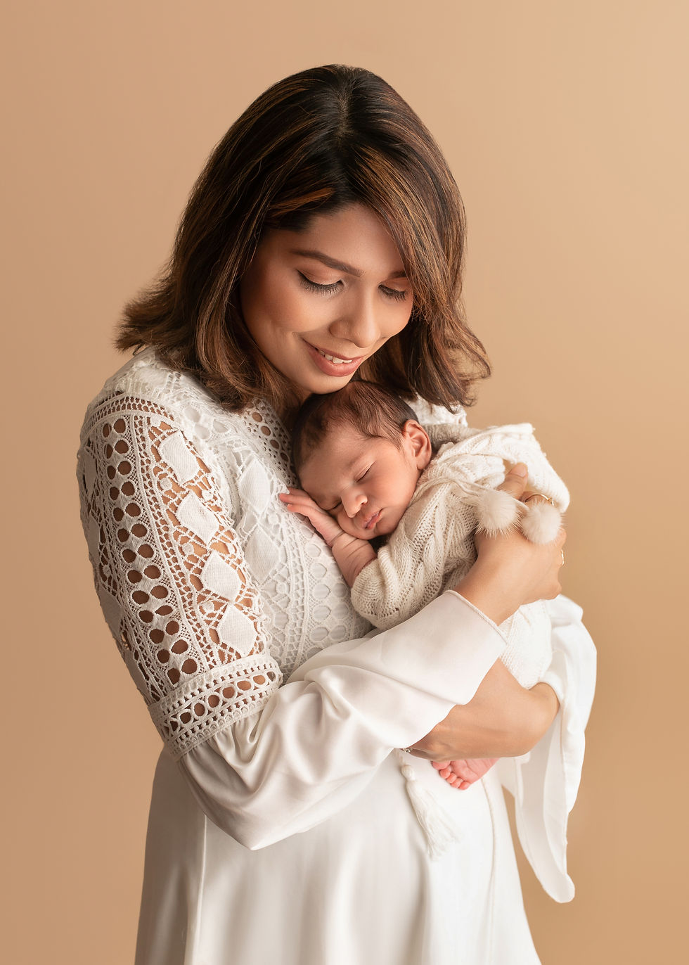 New-born with parents Cuddle