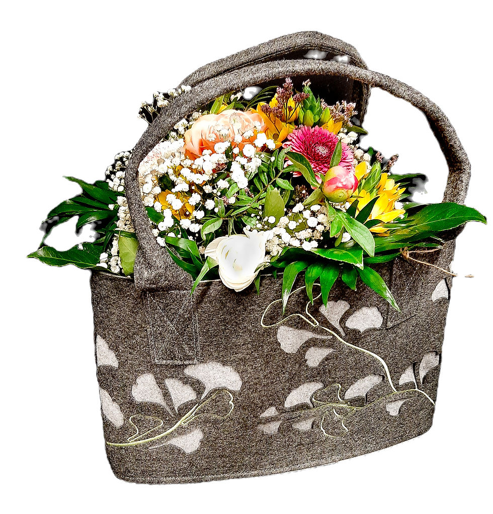 Miniaturbild: Eine elegante Ginko Filztasche von GILDE, gefüllt mit einem farbenfrohen, Blumenstrauß