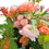 Thumbnail: Premium Blumenstrauß mit Rosen, Ranunkeln, Chrysanthemen & Alstromerien in Apricot- und Rosétönen. Handgebunden