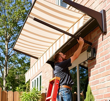 man installing an awning.jpg