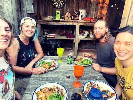 The farm crew enjoying dinner together.