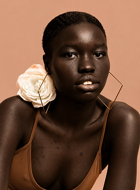 Peach Editorial Portrait with Geometric Gold Earrings.png