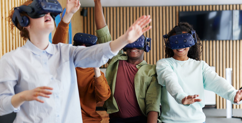 Friends exploring virtual worlds together at MeetspaceVR in Bristol, engaging in thrilling adventures in a simulated environment