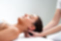 Close up of chiropractor pressing back of head. Therapist doing healing massage with fing