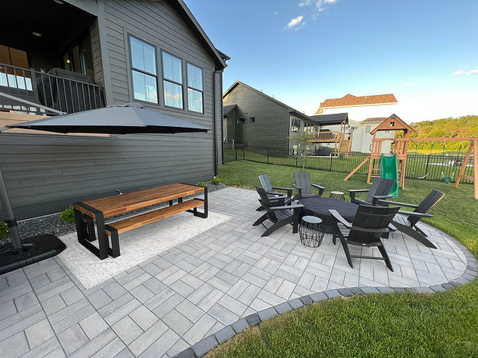 Landscape patio natural stone boulders water feature flagstone plants retaining wall.jpg
