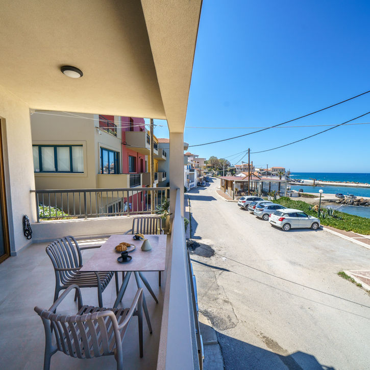 Balcony with sea and village view in Panormo Crete beachfront suite