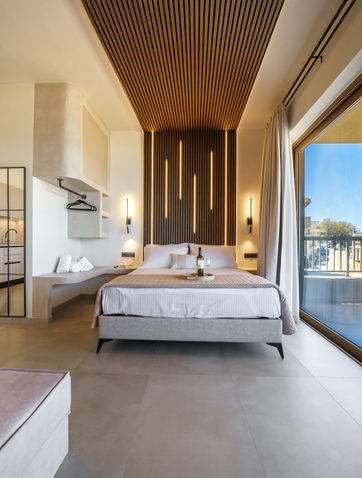 Open plan bedroom with sea view in beachfront suite Panormo Crete