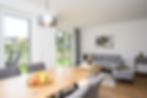 ZingstPUR Apartment mit Blick ins Wohnzimmer