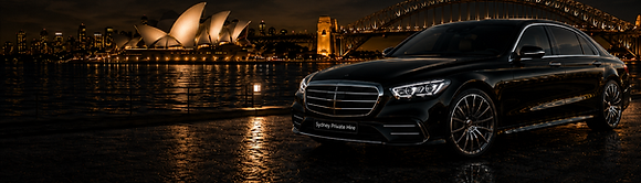 Sydney Harbour at night with the Opera House and Harbour Bridge