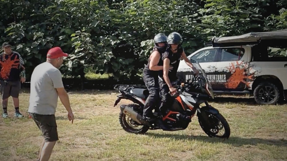 Belinda and Clayton Hudson mastering the fine art of sharp turns as a rider pillion team