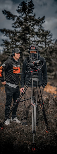 Documentary filmmaking crew capturing outdoor interview for non-profit storytelling project