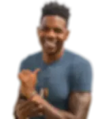 Smiling man pointing his thumb left