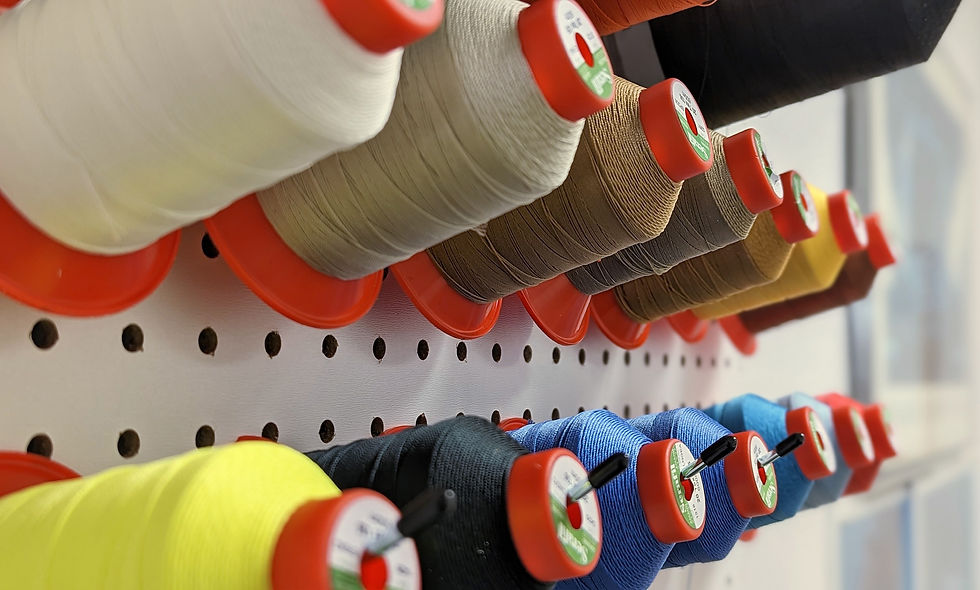 peg wall with lots of colourful thread spools