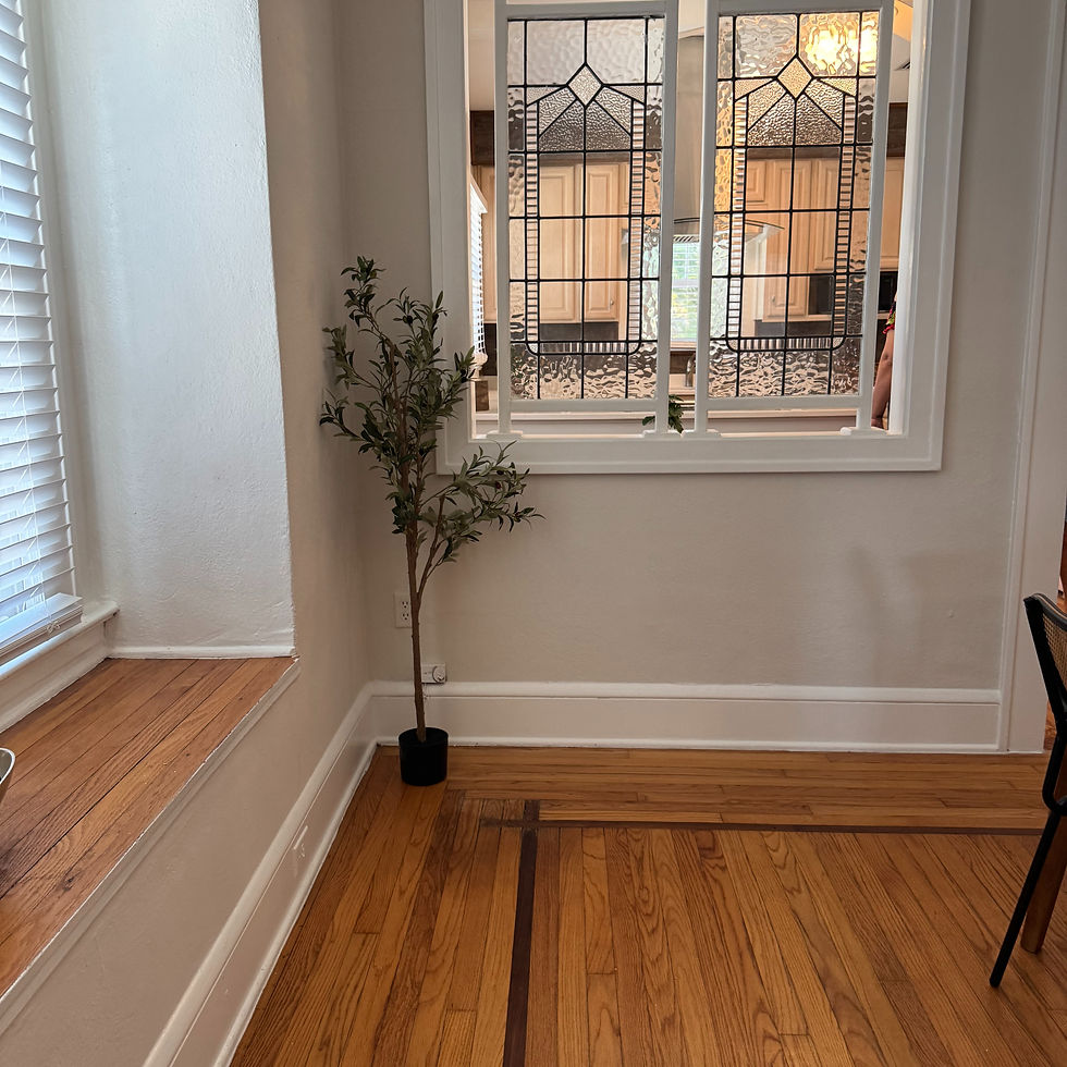 Original 100-year-old wood floors and glass windows