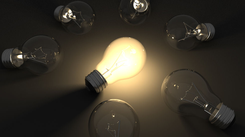 A glowing light bulb is surrounded by unlit bulbs on a dark background, highlighting contrast and focus on the illuminated bulb.