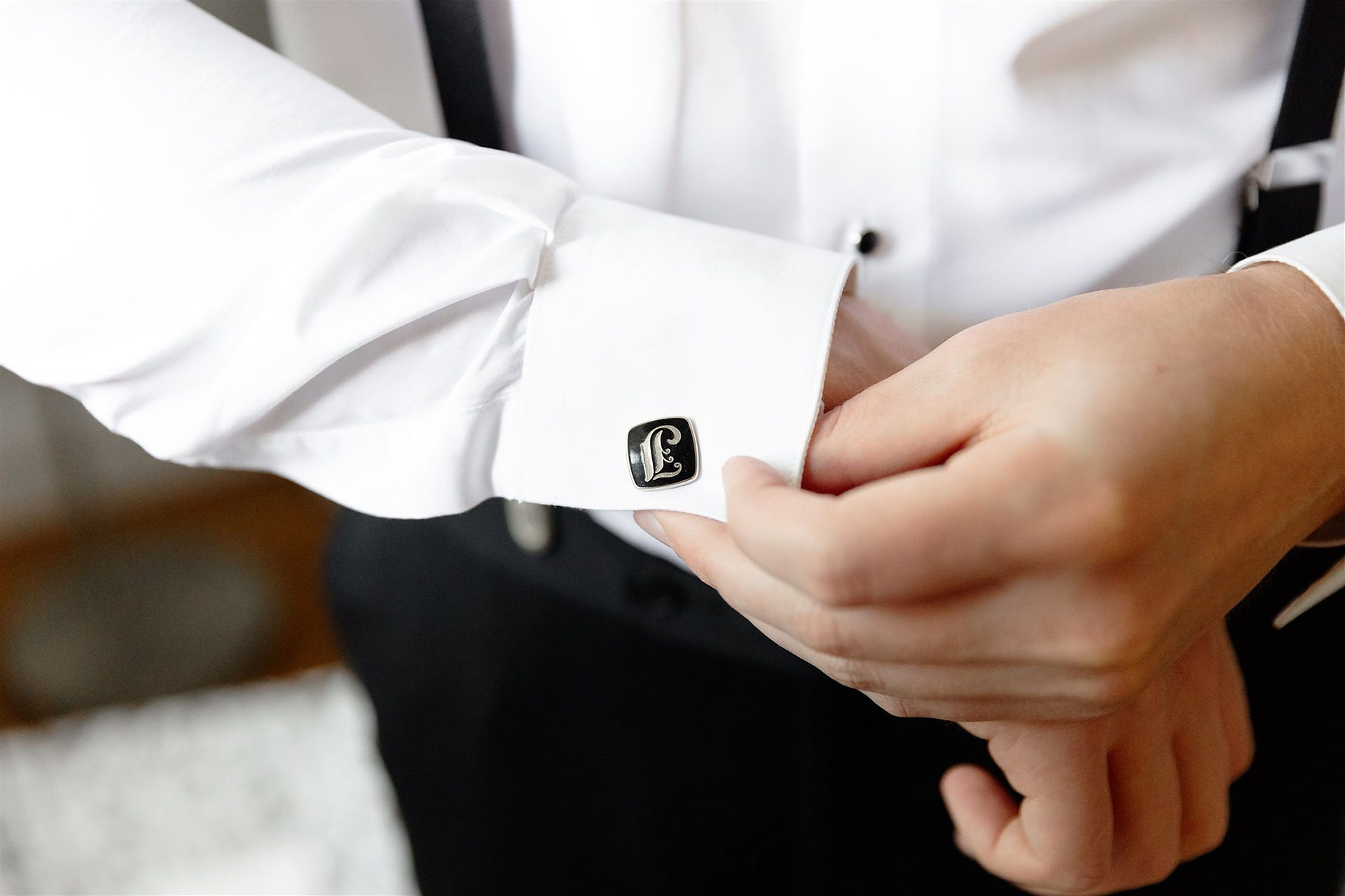 Groom detail photo of cufflinks
