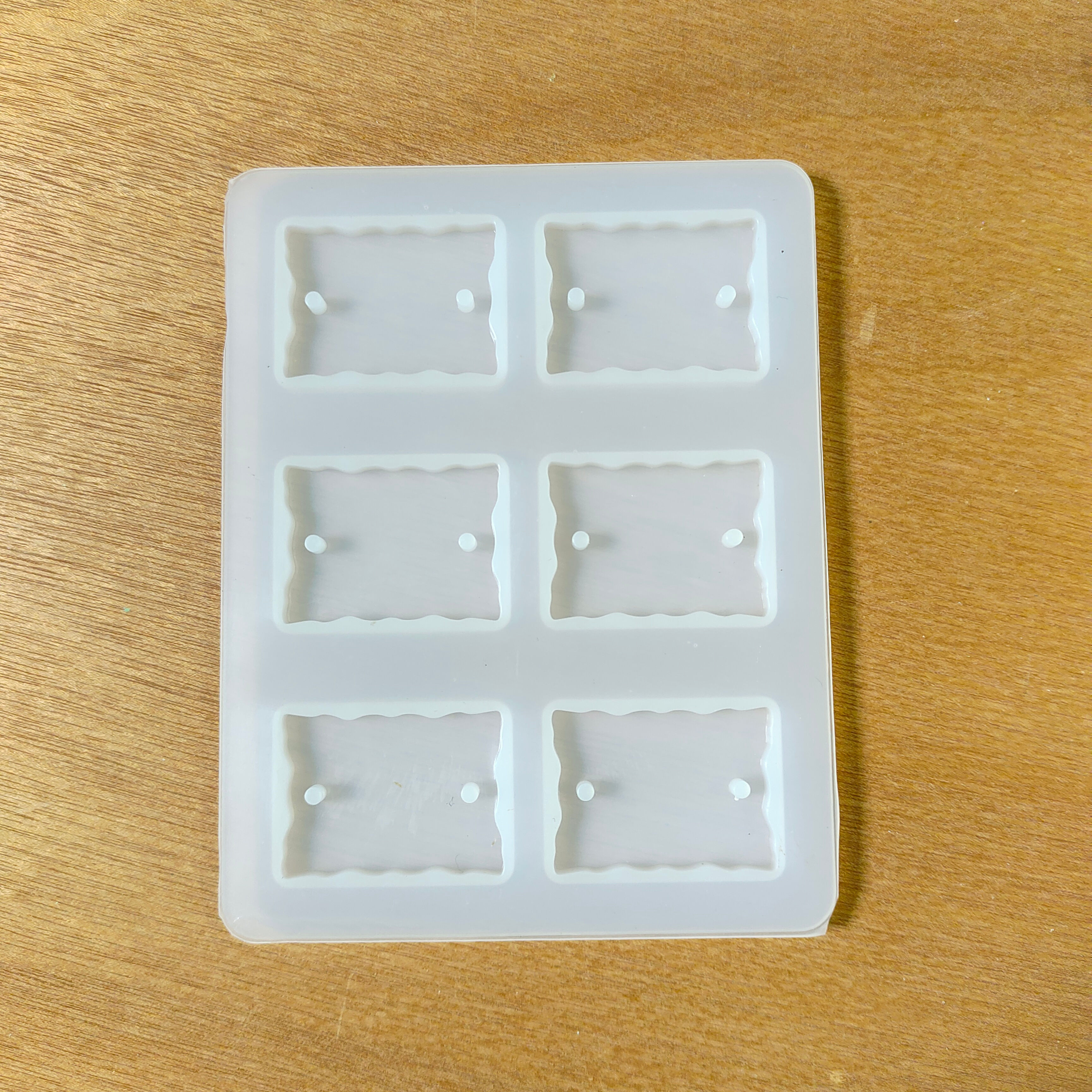 Rakhi Moulds in rectangle agate shapes for creating personalized, resin-based Rakhi designs.