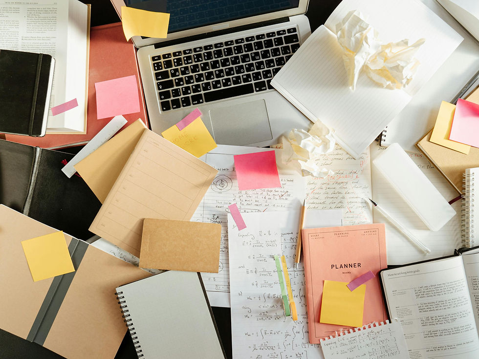 Messy pile of notes, papers, etc