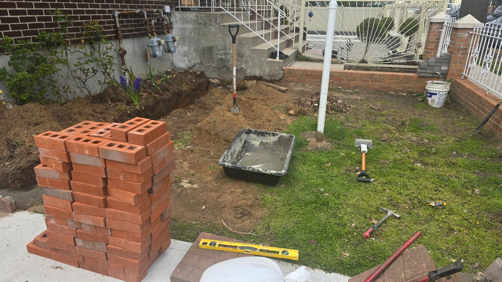 Prep retaining wall and stone patio 1.JPG