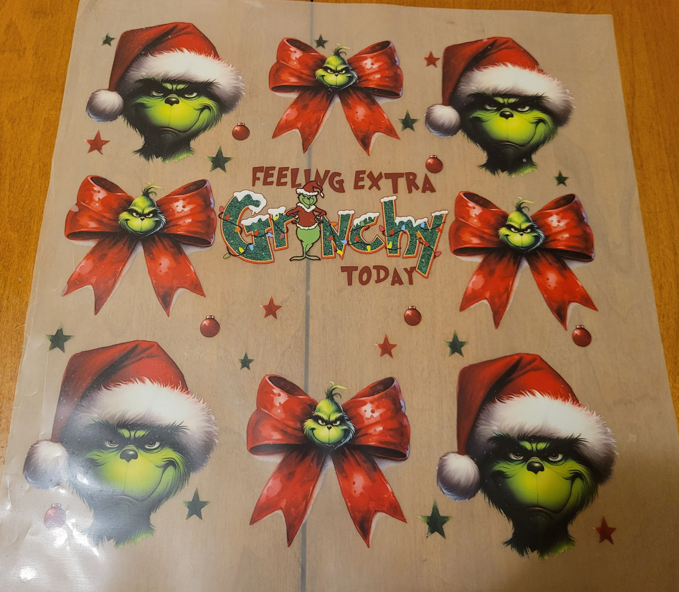 Sheet of Grinch and red bow DTF transfers, Feeling Extra Grinchy Today
