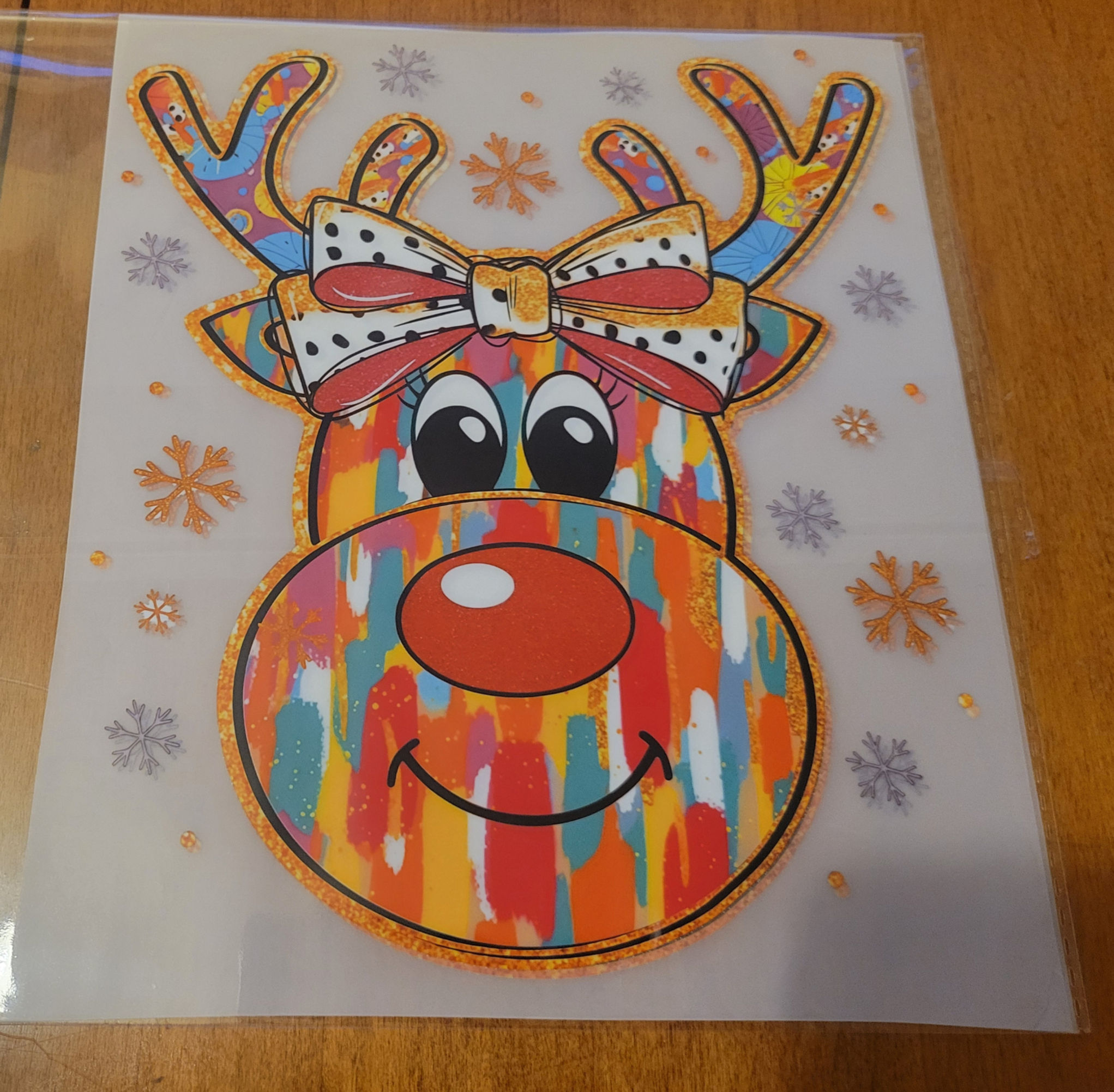 Colorful reindeer DTF transfer with snowflakes
