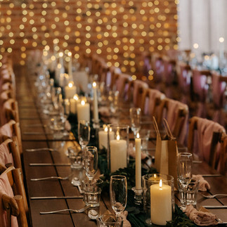 wedding reception tables with pink chiffon chair sashes at Howard Court