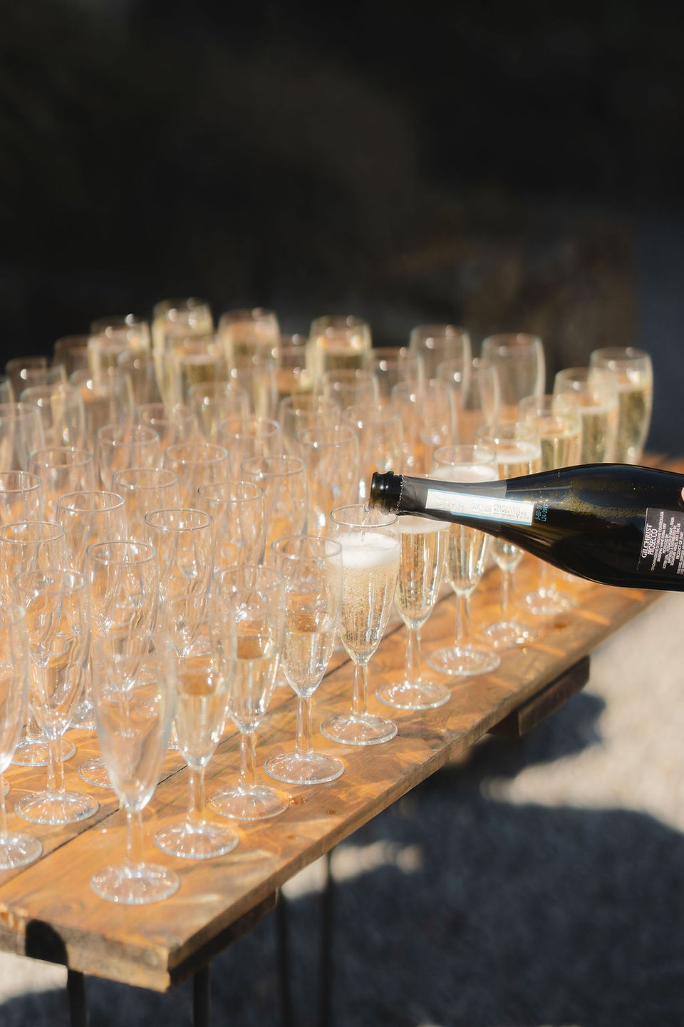 prosecco being poured for a wedding at Danby Castle