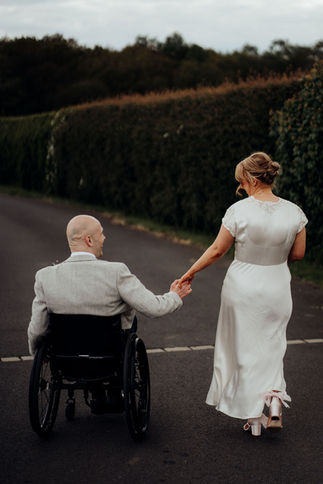 bride and groom holding hands together The Hidden Oak