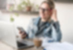 Manager delegating tasks to an employee via virtual meeting